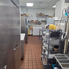 Logo Commercial kitchen space for rent with plenty of freezer space and equipment